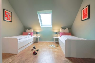 Schlafzimmer mit Einzelbetten Ferienwohnung Soete Stuuv